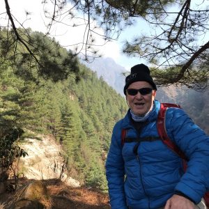 Ken climbing a mountain